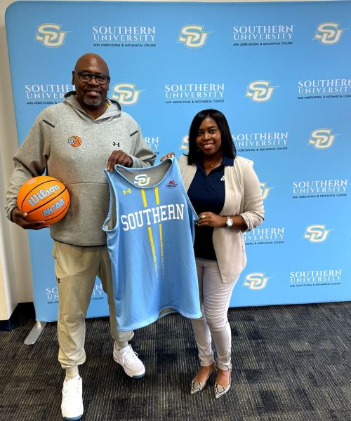 Southern University Men's Basketball Head Coach Kevin Johnson, with Roeshawn Peters, Associated Grocers Corporate Marketing Manager.